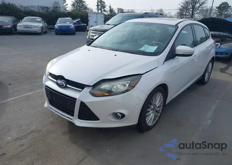 2013 Ford Focus Titanium z USA, uszkodzony, nr VIN 1FADP3N26DL108626